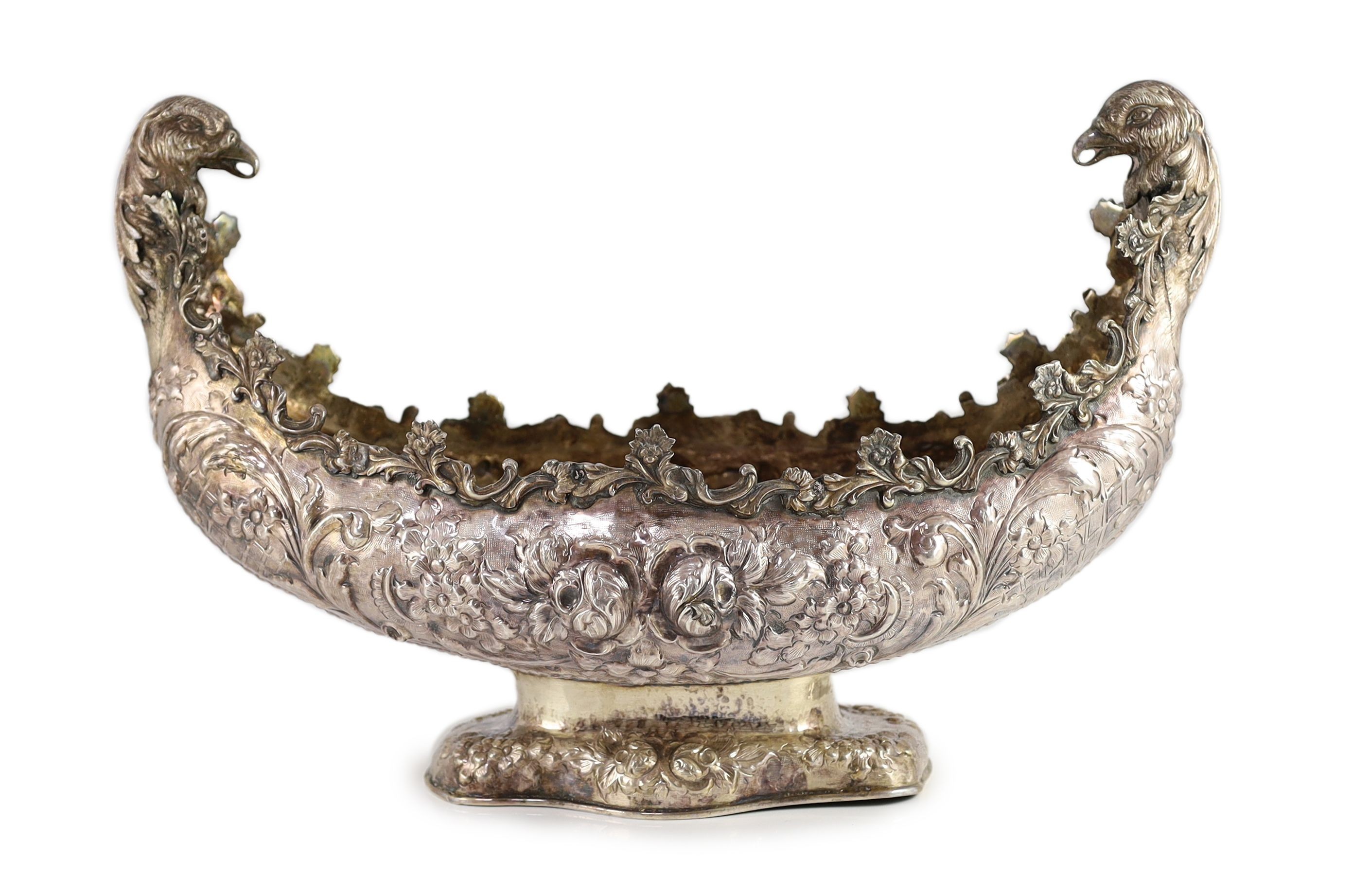 A 20th century Continental embossed 900 standard silver boat shaped centrepiece bowl